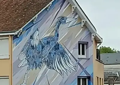 Wandbemalung in grau blau Tönen mit einem Reiher